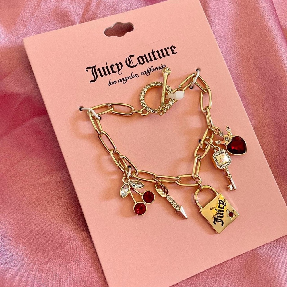 Juicy couture  
Rhinestone heart Charm bracelet
